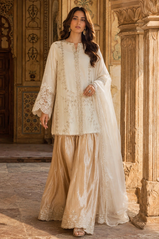 Celestine Ivory luxury ivory Korean silk formal dress featuring an embroidered straight shirt, crushed Korean silk sharara, and embroidered organza dupatta by Miraam.