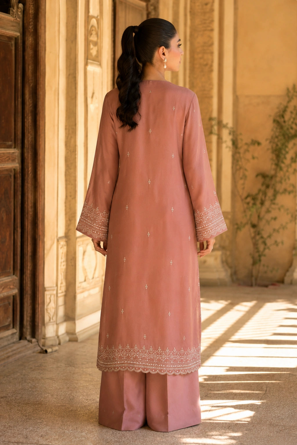 Roselune Blush luxury blush pink Korean silk formal dress featuring an embroidered straight shirt, flared trousers, and an embroidered organza dupatta by Miraam.