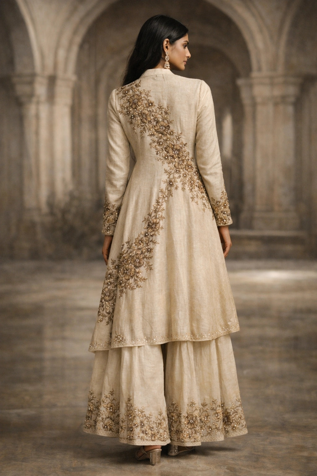 Ivory formal wrap shirt with embroidered gharara by Miraam, styled in a luxury editorial setting