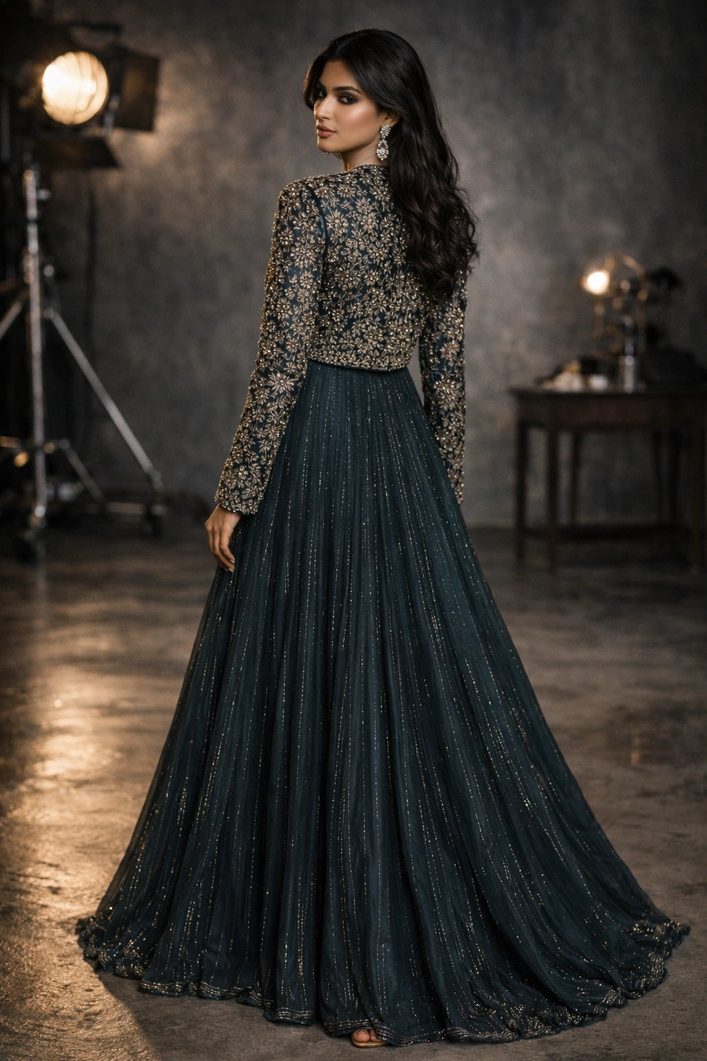 Teal formal gown with embellished cropped jacket by Miraam, styled in an elegant studio editorial