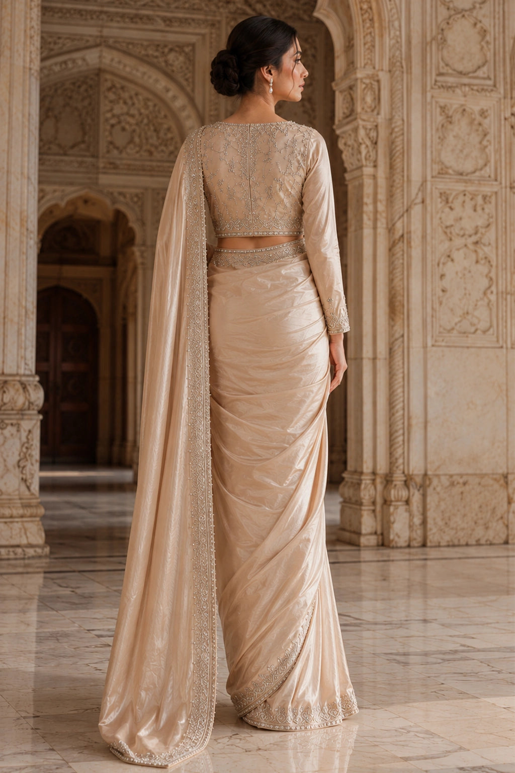 Aurelia Champagne sheesha silk saree with embroidered blouse and detailed border by Miraam