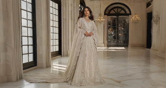 Luxury heritage formal outfit featuring intricate handcrafted details and timeless Pakistani occasion wear aesthetics