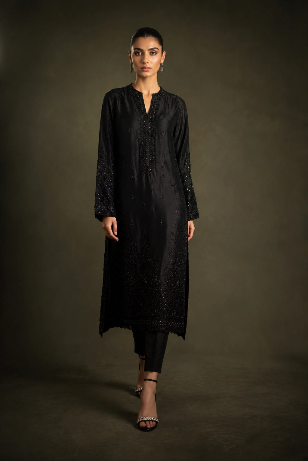 Noir Étoile by Miraam featuring a black sheesha silk embroidered formal with matching trousers and an embroidered organza dupatta.
