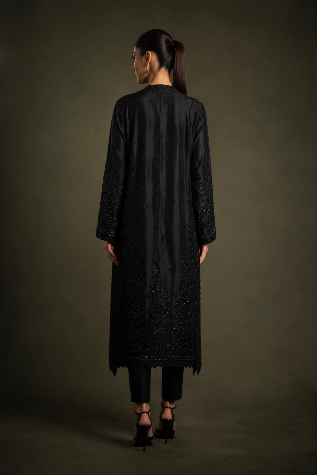 Noir Étoile by Miraam featuring a black sheesha silk embroidered formal with matching trousers and an embroidered organza dupatta.