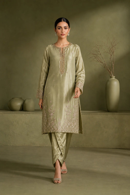 Sage Élise by Miraam featuring a soft sage green sheesha silk embroidered shirt with tulip trousers and an embroidered organza dupatta.