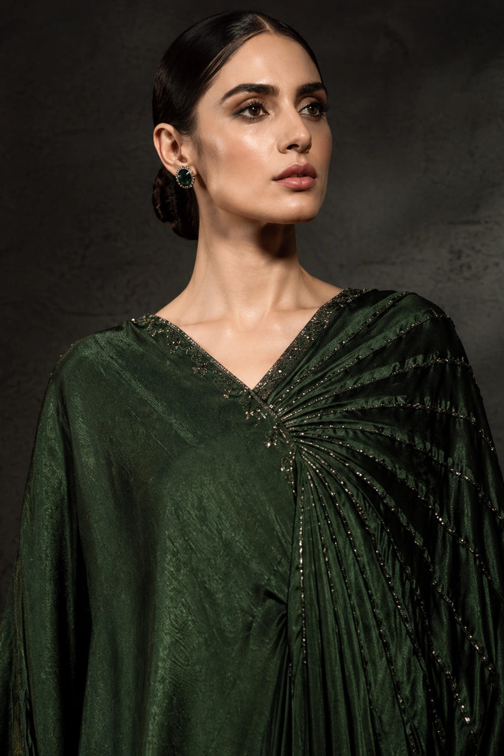 Emerald green sheesha silk kaftan with pleated drape detail by Miraam