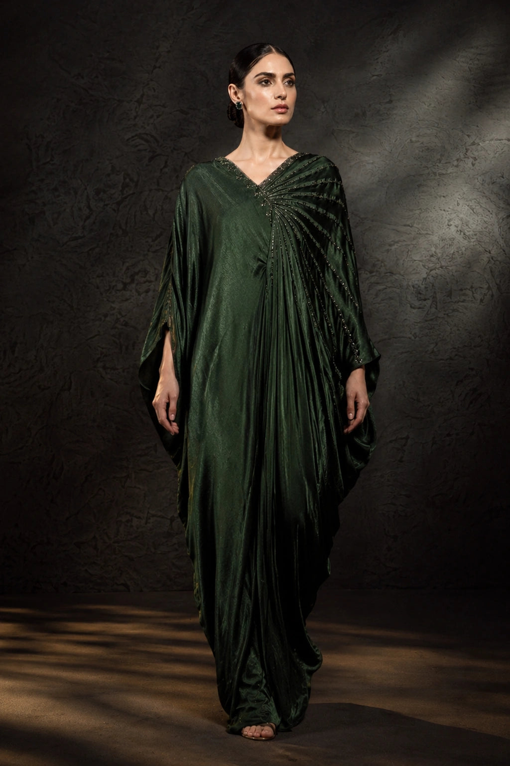Emerald green sheesha silk kaftan with pleated drape detail by Miraam