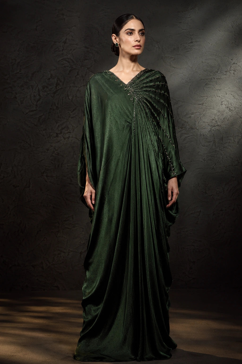Emerald green sheesha silk kaftan with pleated drape detail by Miraam