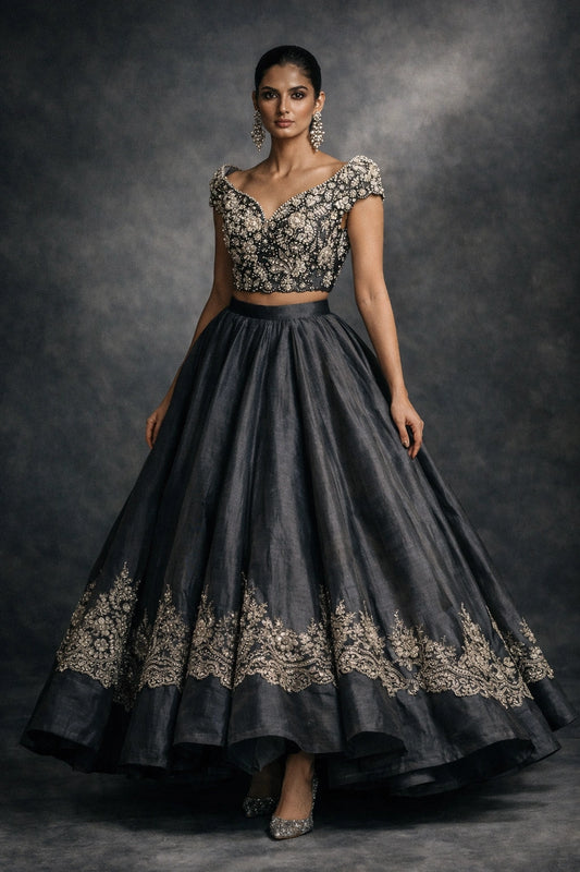 Charcoal formal lehenga with embellished blouse by Miraam, styled in a luxury studio editorial