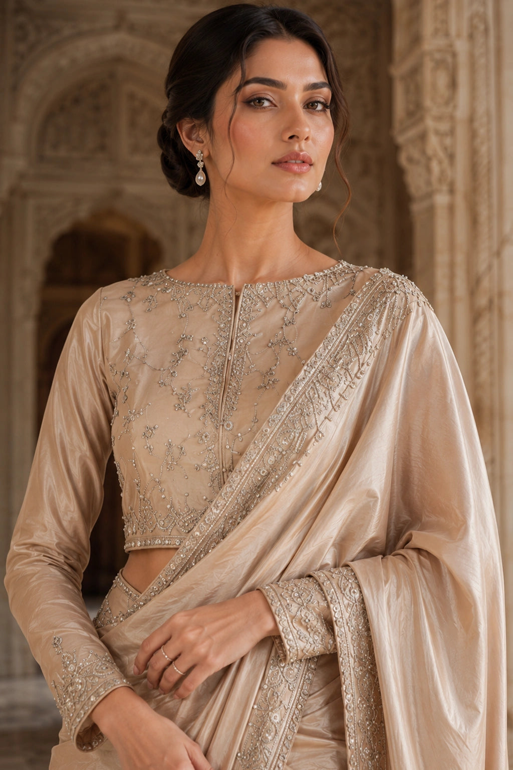 Aurelia Champagne sheesha silk saree with embroidered blouse and detailed border by Miraam