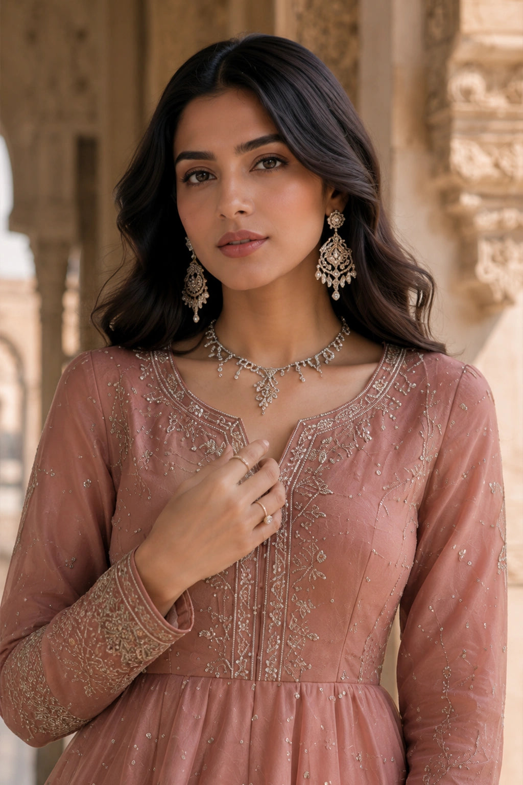 Gulnaar Blush embroidered net peplum with sheesha silk lined lehenga and organza dupatta by Miraam