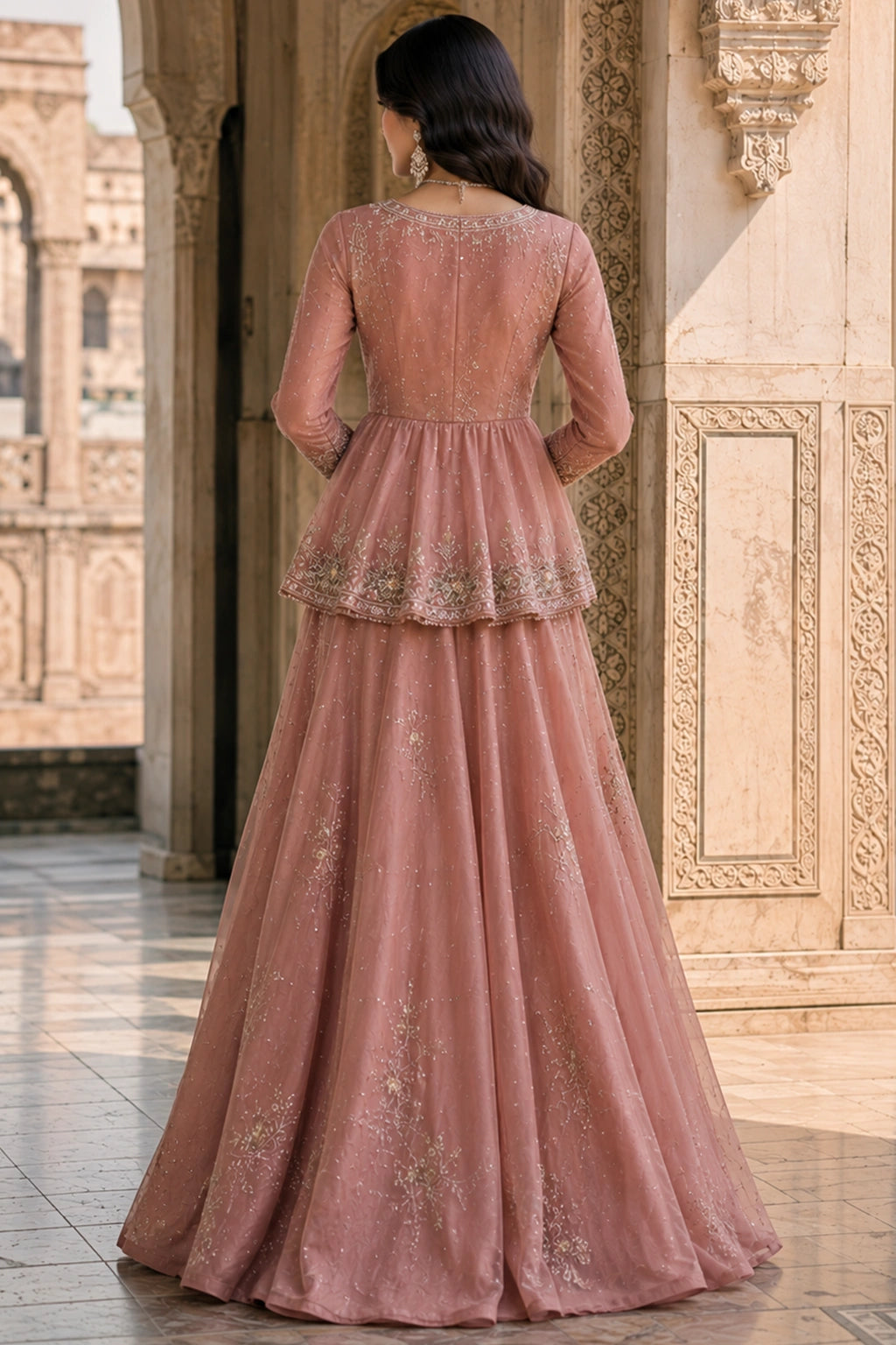 Gulnaar Blush embroidered net peplum with sheesha silk lined lehenga and organza dupatta by Miraam