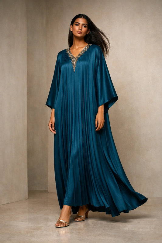 Teal silk pleated kaftan with embellished neckline, modern Pakistani luxury evening wear