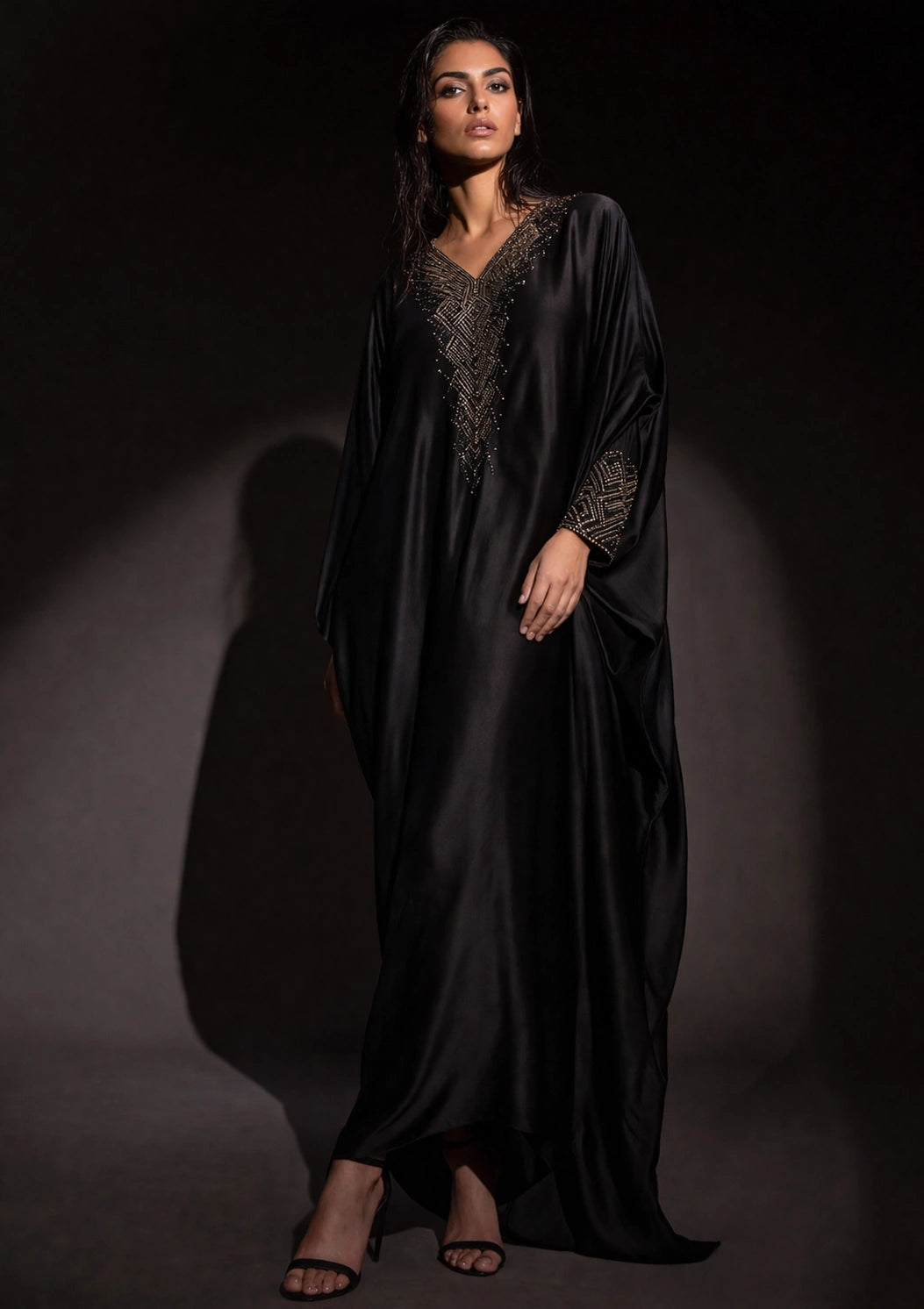 Black silk kaftan with gold embellished neckline, luxury Pakistani evening kaftan dress