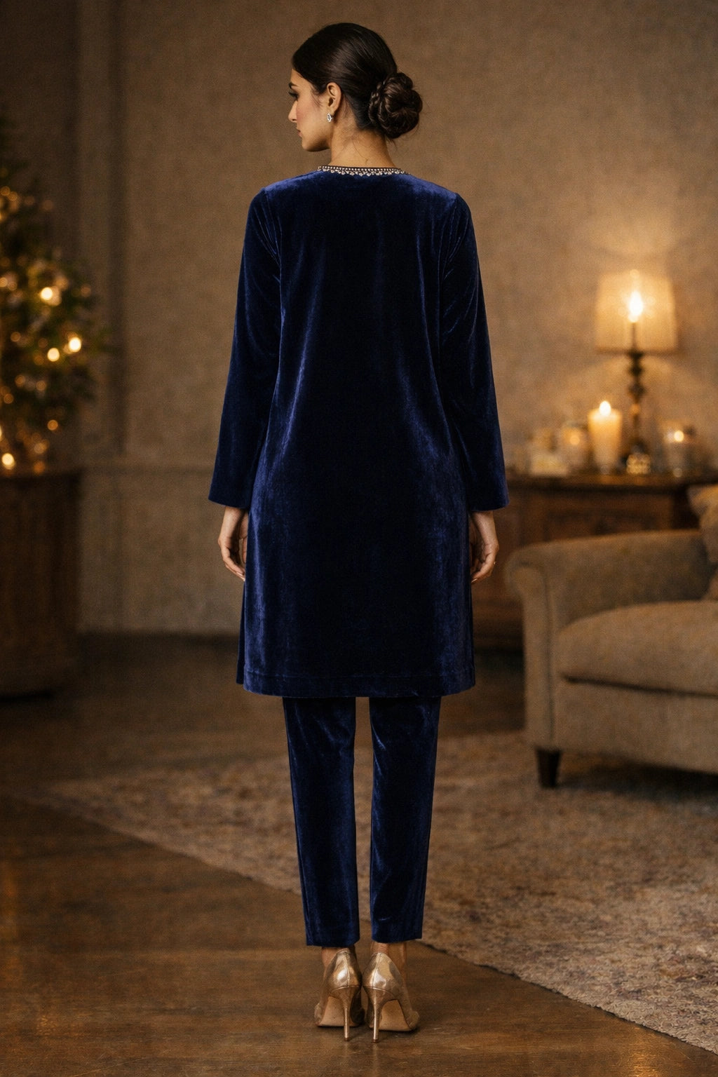 Midnight blue velvet formal ensemble featuring a clean silhouette and subtle neckline embellishment by Miraam.