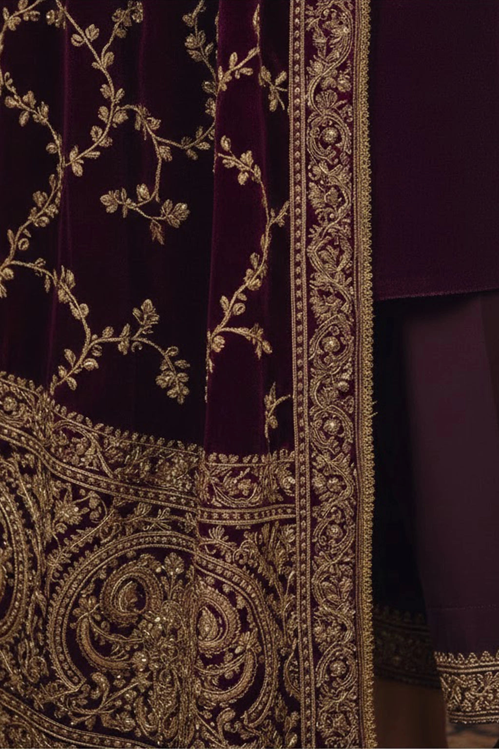 Plum velvet formal ensemble featuring delicate embroidered detailing and a richly embellished velvet dupatta by Miraam.